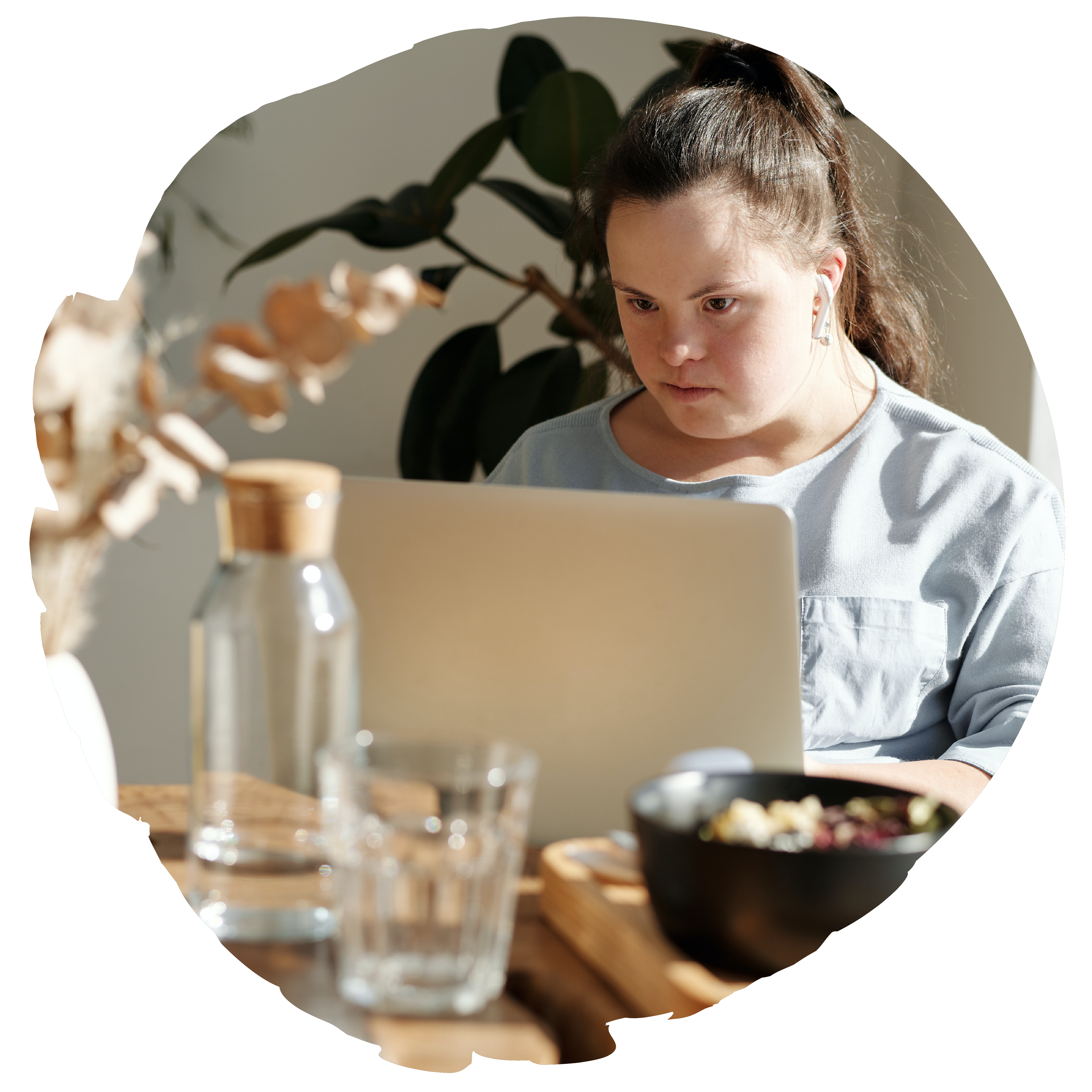 Picture of girl focused on a laptop